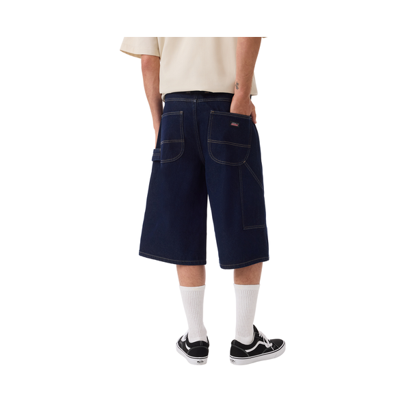 lifestyle photo of man wearing genuine dickies pants